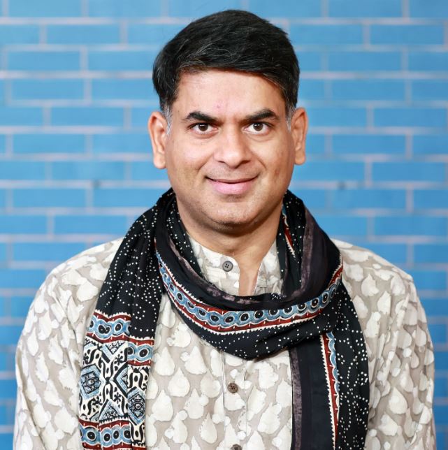 Saurabh Dwivedi, founding editor of The Lallantop, posing at a news event.