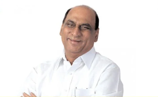 Portrait of veteran Indian politician and educationist Datta Meghe (1936–2026) in a white traditional outfit.