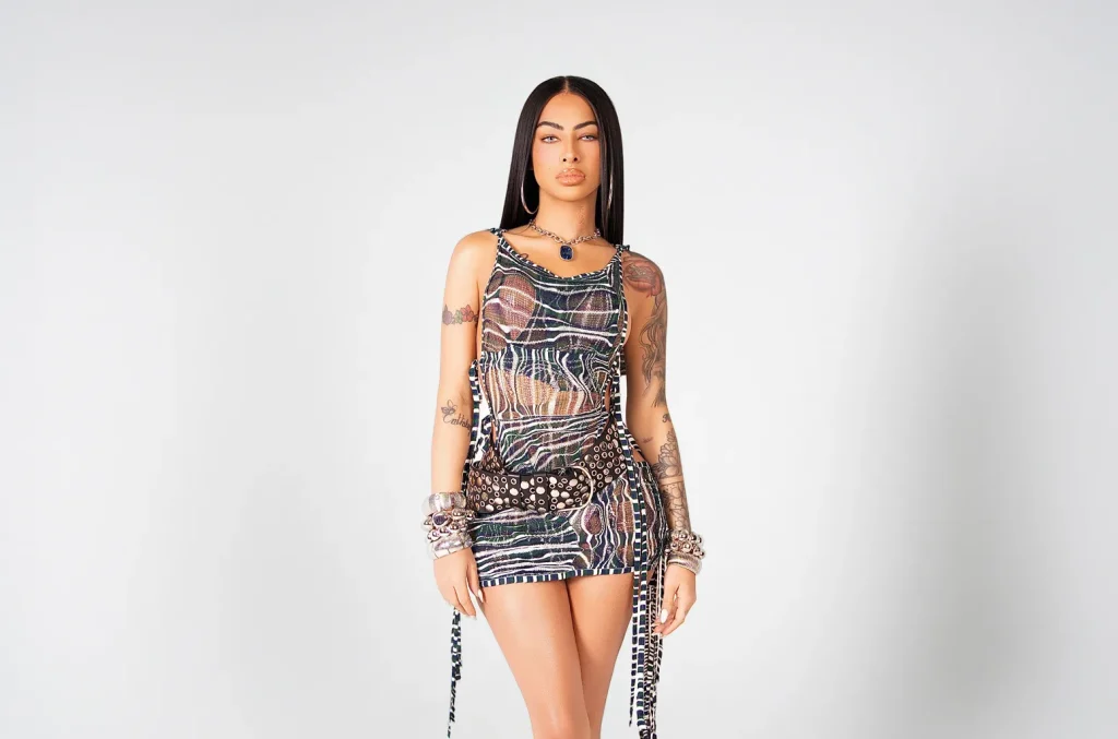 Dominican artist Yailin La Más Viral in beautiful dress; context of her March 2026 arrest in Santo Domingo for firearm possession.