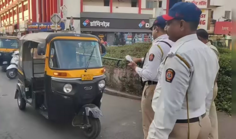 A yellow and green Gurugram auto-rickshaw parked near a police station