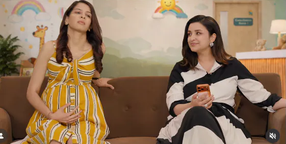 Parineeti Chopra smiling during the premiere of her talk show ‘Mom Talks’ on ZEE5, reflecting on her journey into motherhood.